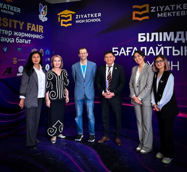 With the staff at the Ziyatker school university fair